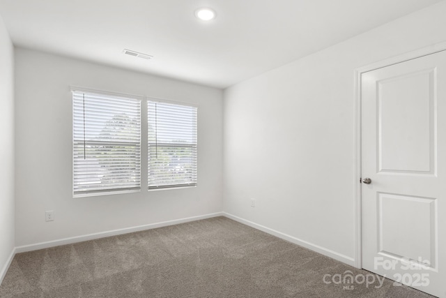 1112 Angle St, Cherryville, NC 28021 - carpeted spare room with baseboards and recessed lighting