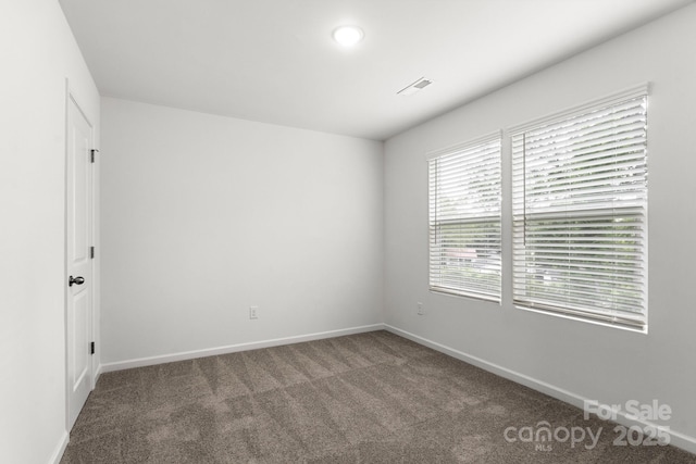 1112 Angle St, Cherryville, NC 28021 - empty room featuring carpet flooring and baseboards