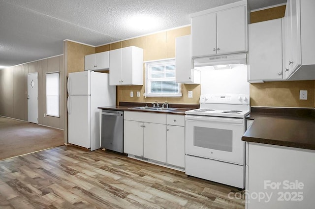 203 Bethlehem Church Rd, Grover, NC 28073 - kitchen featuring white appliances, under cabinet range hood, a sink, dark countertops, and a textured ceiling