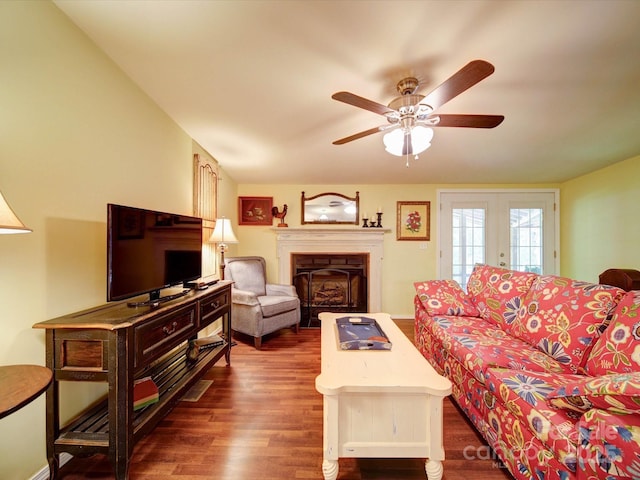157 Old Hearth Rd, Clover, SC 29710 - living room featuring dark wood finished floors, a ceiling fan, french doors, and a fireplace