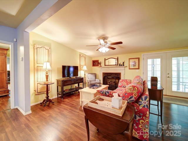 157 Old Hearth Rd, Clover, SC 29710 - living room with a fireplace, dark wood-style floors, ceiling fan, baseboards, and french doors