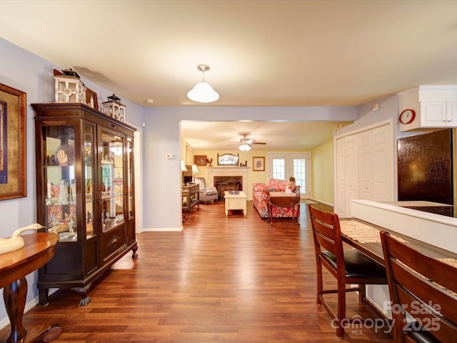 157 Old Hearth Rd, Clover, SC 29710 - living area featuring dark wood-style flooring, a fireplace, a ceiling fan, and baseboards