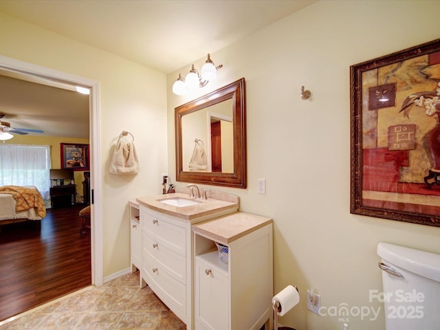 157 Old Hearth Rd, Clover, SC 29710 - ensuite bathroom featuring vanity, toilet, ceiling fan, and baseboards