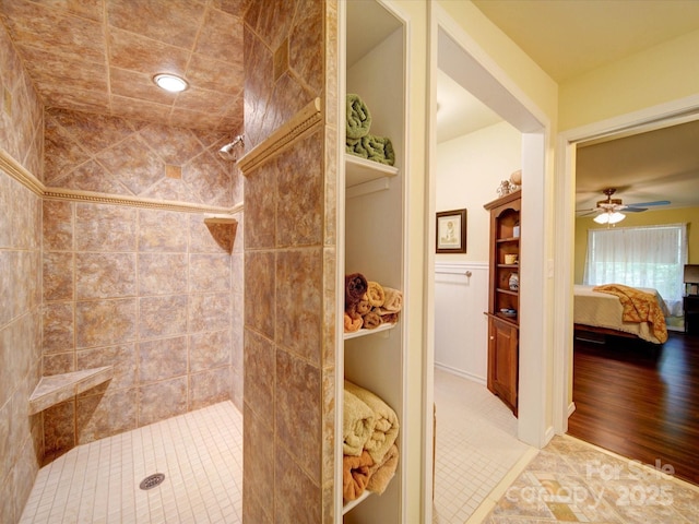 157 Old Hearth Rd, Clover, SC 29710 - ensuite bathroom featuring tiled shower, ceiling fan, and tile patterned floors