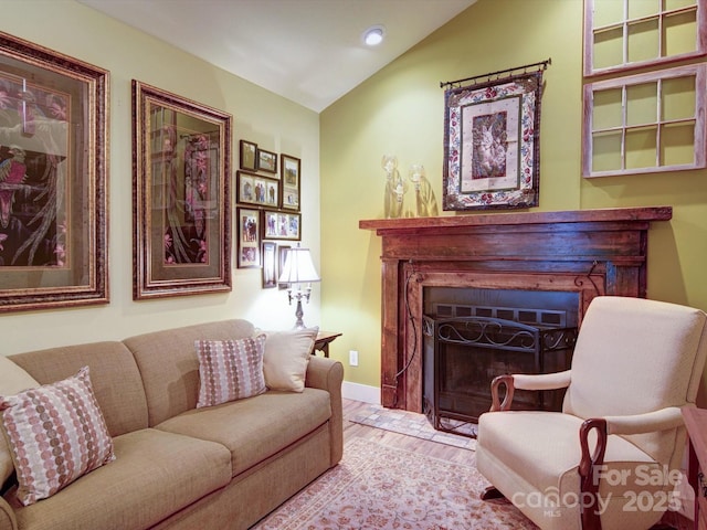 157 Old Hearth Rd, Clover, SC 29710 - living room with wood finished floors, recessed lighting, vaulted ceiling, a fireplace with flush hearth, and baseboards