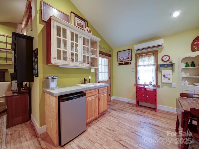 157 Old Hearth Rd, Clover, SC 29710 - kitchen with a wall mounted AC, a sink, fridge, light wood-style flooring, and vaulted ceiling