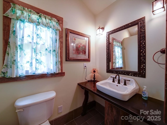 157 Old Hearth Rd, Clover, SC 29710 - bathroom featuring a sink, toilet, tile patterned floors, and baseboards
