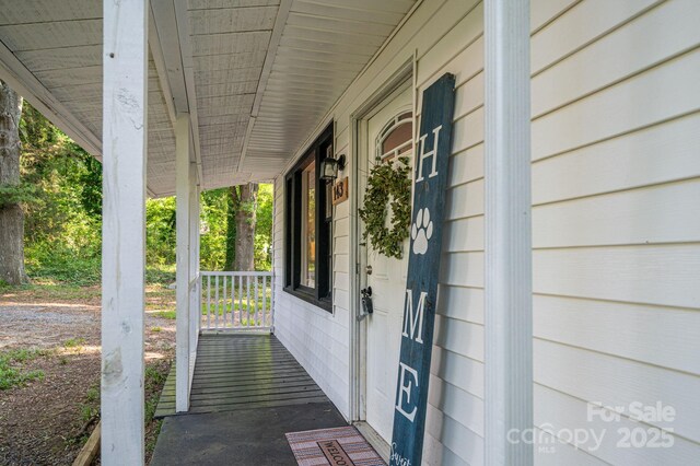 143 Hallman St, Cherryville, NC 28021 - property entrance featuring covered porch