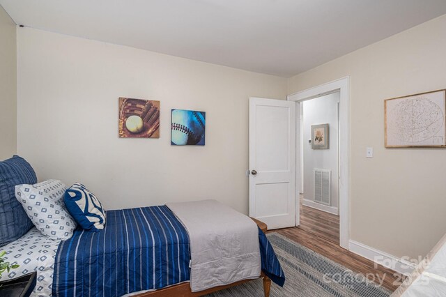 143 Hallman St, Cherryville, NC 28021 - bedroom featuring wood finished floors and baseboards