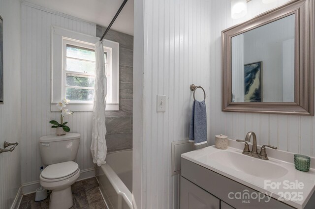143 Hallman St, Cherryville, NC 28021 - bathroom with toilet, vanity, shower / bath combo with shower curtain, and baseboards