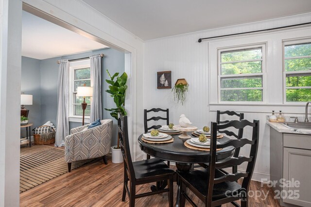 143 Hallman St, Cherryville, NC 28021 - dining room featuring wood finished floors and ornamental molding
