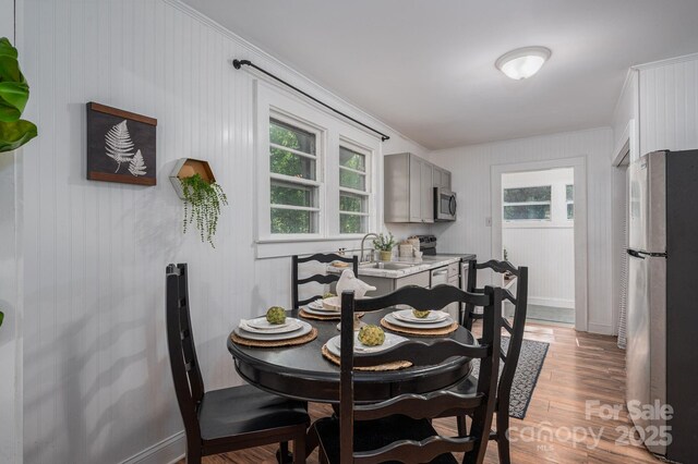 143 Hallman St, Cherryville, NC 28021 - dining room with light wood finished floors, plenty of natural light, and baseboards
