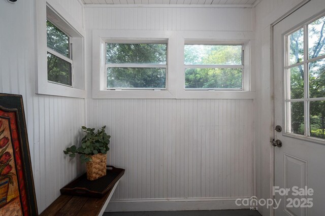 143 Hallman St, Cherryville, NC 28021 - doorway featuring plenty of natural light and wood walls