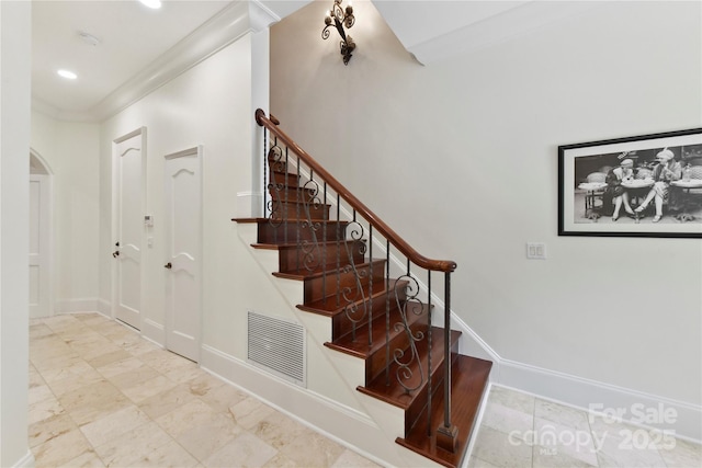 2240 La Maison Dr, Charlotte, NC 28226 - stairway featuring arched walkways, crown molding, baseboards, and recessed lighting