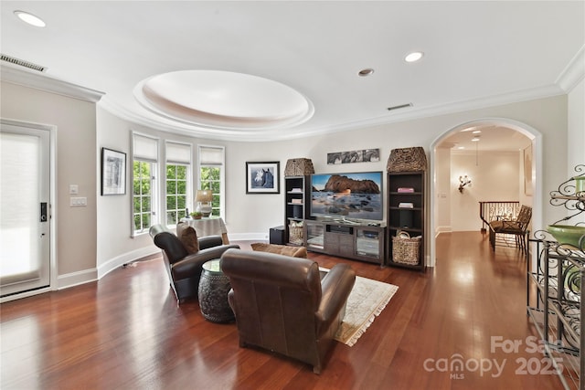 2240 La Maison Dr, Charlotte, NC 28226 - living area with crown molding, arched walkways, wood finished floors, recessed lighting, and baseboards