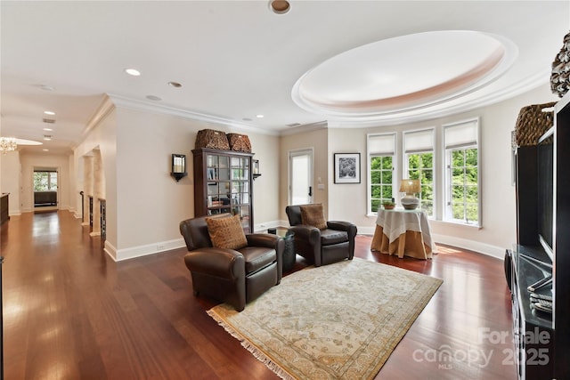 2240 La Maison Dr, Charlotte, NC 28226 - living area with dark wood finished floors, recessed lighting, and ornamental molding