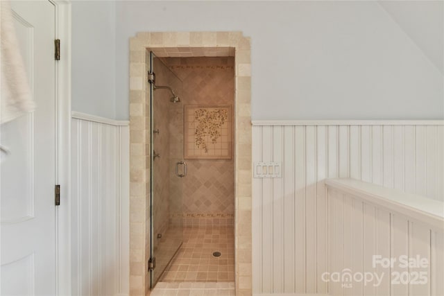 2240 La Maison Dr, Charlotte, NC 28226 - bathroom featuring wainscoting and a stall shower