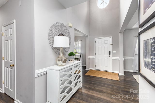 10198 Tintinhull Dr, Fort Mill, SC 29707 - foyer featuring dark wood finished floors, baseboards, and a high ceiling
