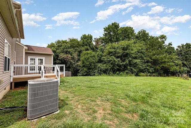 10198 Tintinhull Dr, Fort Mill, SC 29707 - view of green lawn featuring central AC unit and a deck