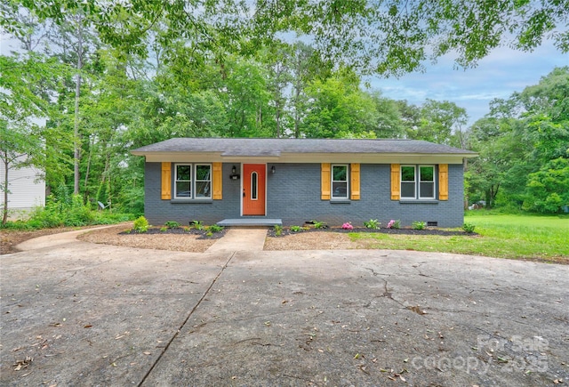 1010 Fallston Rd, Shelby, NC 28150 - view of front of property featuring brick siding, crawl space, concrete driveway, and a porch