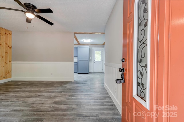1010 Fallston Rd, Shelby, NC 28150 - entryway with wood finished floors, wainscoting, a ceiling fan, and baseboards