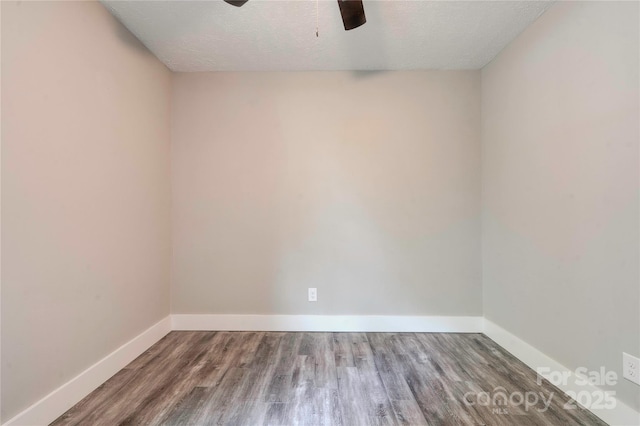 1010 Fallston Rd, Shelby, NC 28150 - spare room featuring ceiling fan, wood finished floors, baseboards, and a textured ceiling