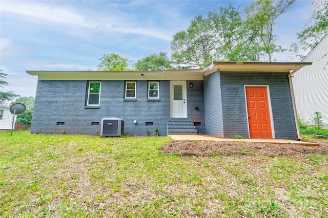 1010 Fallston Rd, Shelby, NC 28150 - view of front of house featuring entry steps, brick siding, crawl space, central AC, and a front yard