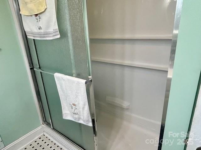 1014 Wright St SW Unit # 4, Lenoir, NC 28645 - bathroom with a shower stall and baseboards