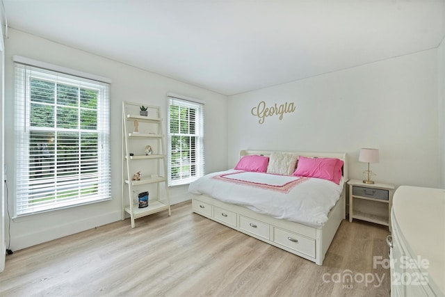 1119 Thornsby Ln, Matthews, NC 28105 - bedroom featuring light wood-style floors