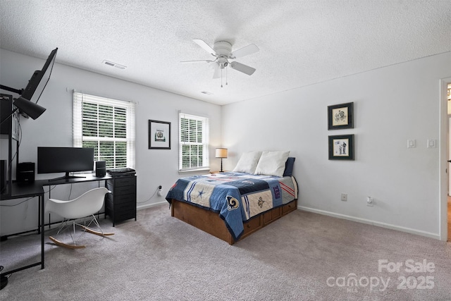 1119 Thornsby Ln, Matthews, NC 28105 - carpeted bedroom with a textured ceiling, ceiling fan, a desk, and baseboards