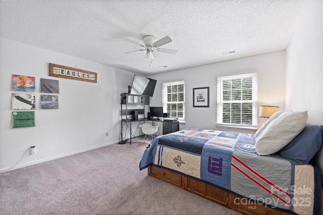 1119 Thornsby Ln, Matthews, NC 28105 - bedroom with carpet flooring, a desk, a textured ceiling, ceiling fan, and baseboards