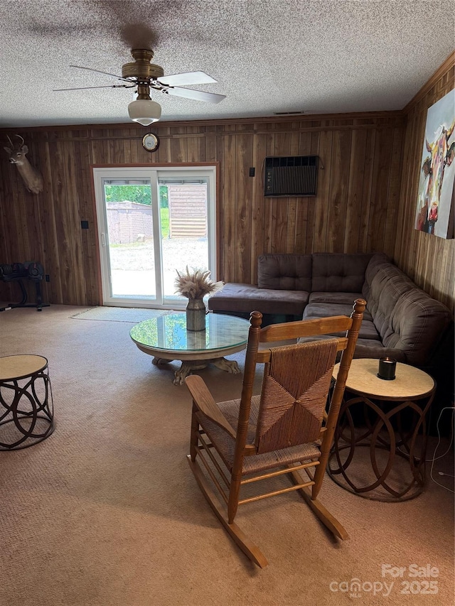 850AND830 E NC-152 Hwy E, China Grove, NC 28023 - living room with wooden walls, light colored carpet, a textured ceiling, and ceiling fan