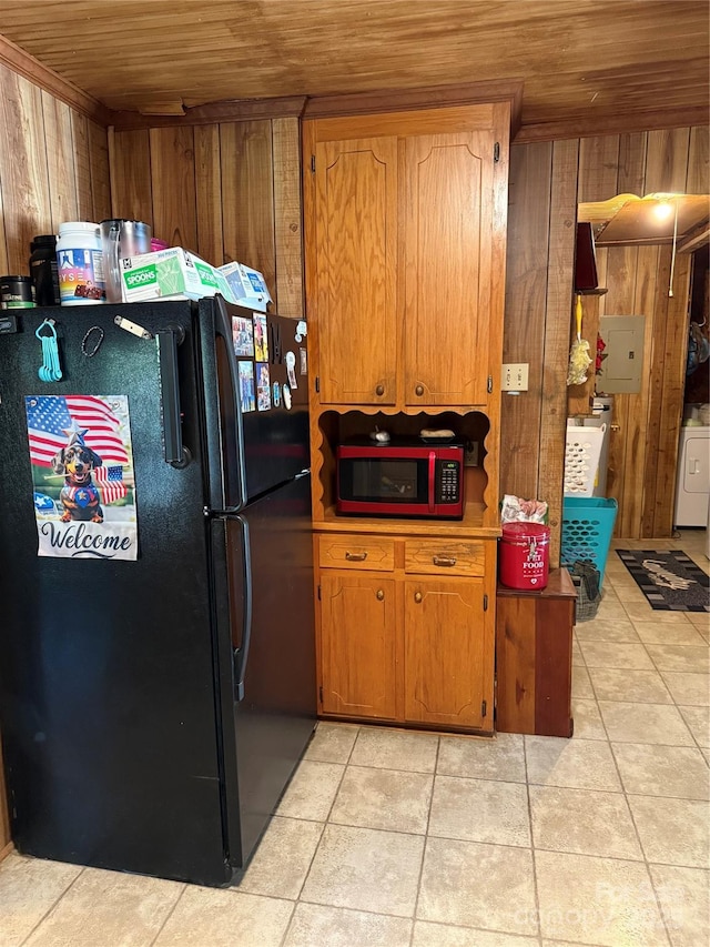850AND830 E NC-152 Hwy E, China Grove, NC 28023 - kitchen featuring freestanding refrigerator, wooden ceiling, wood walls, brown cabinetry, and electric panel