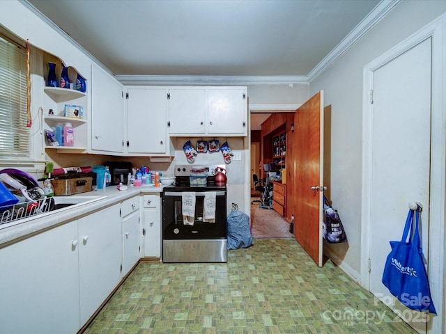 121 Patrick St, Gastonia, NC 28054 - kitchen featuring stainless steel electric range, light countertops, open shelves, white cabinets, and a sink