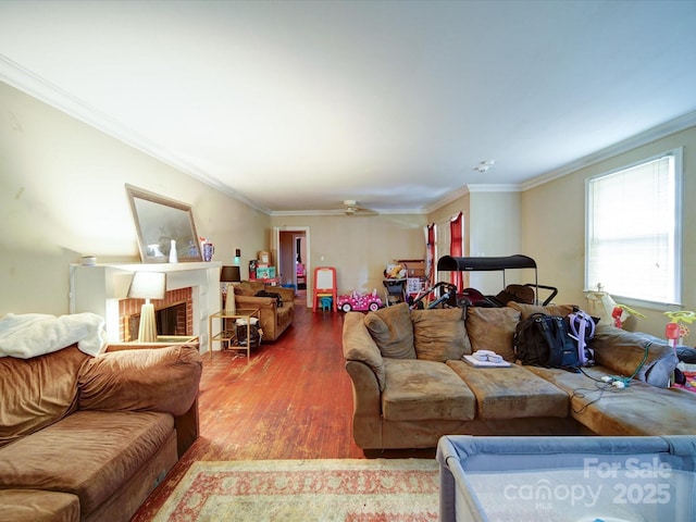 121 Patrick St, Gastonia, NC 28054 - living room with wood finished floors, crown molding, a fireplace, and a ceiling fan