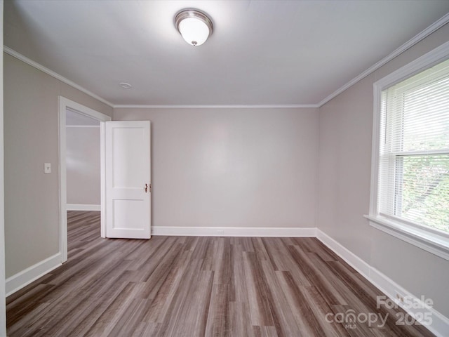 121 Patrick St, Gastonia, NC 28054 - additional living space with wood finished floors, healthy amount of natural light, and baseboards