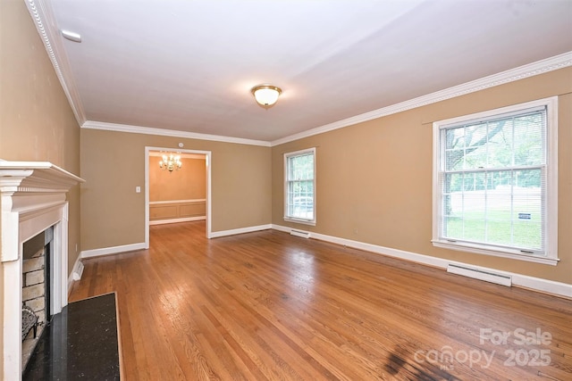 1961 Runnymede Ln, Charlotte, NC 28211 - unfurnished living room featuring a chandelier, a baseboard radiator, wood finished floors, crown molding, and baseboards