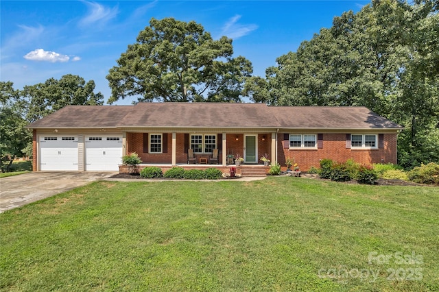 2010 Dogwood Trl, Shelby, NC 28150 - ranch-style home with an attached garage, brick siding, a porch, concrete driveway, and a front yard