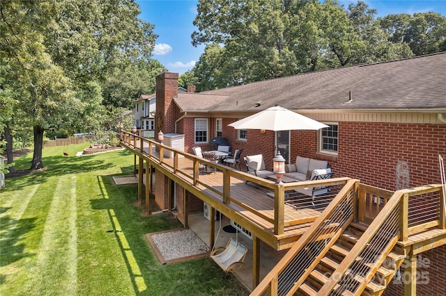 2010 Dogwood Trl, Shelby, NC 28150 - back of property with brick siding, a deck, roof with shingles, a chimney, and a yard