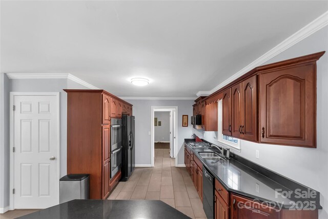 2010 Dogwood Trl, Shelby, NC 28150 - kitchen with dark countertops, a sink, black appliances, ornamental molding, and baseboards