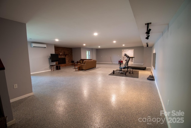 2010 Dogwood Trl, Shelby, NC 28150 - exercise area with a wall mounted AC, a brick fireplace, baseboards, and recessed lighting