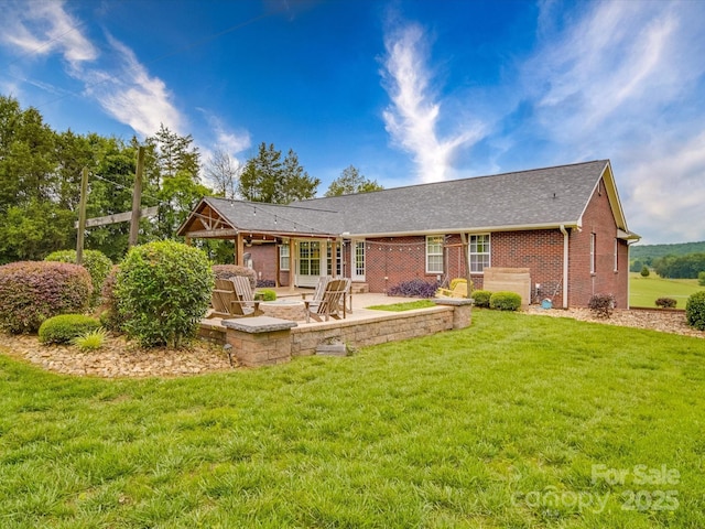 1060 S Lentz Harness Shop Rd, Mount Pleasant, NC 28124 - rear view of house featuring a patio, a lawn, and brick siding