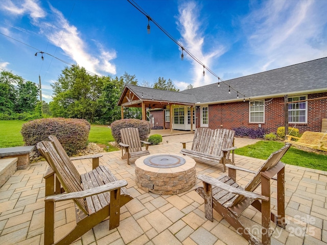 1060 S Lentz Harness Shop Rd, Mount Pleasant, NC 28124 - view of patio / terrace featuring a fire pit and french doors