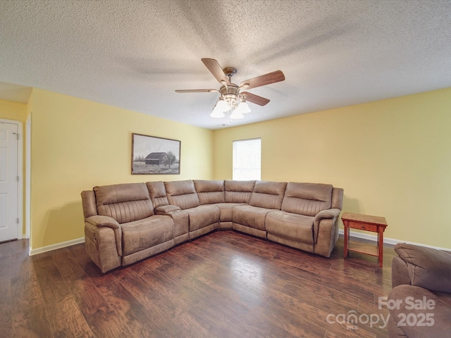 1060 S Lentz Harness Shop Rd, Mount Pleasant, NC 28124 - living area with ceiling fan, wood finished floors, baseboards, and a textured ceiling