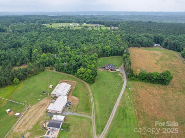 1060 S Lentz Harness Shop Rd, Mount Pleasant, NC 28124 - aerial view of property's location with a heavily wooded area