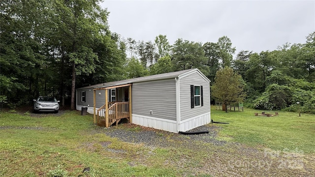 143 Hamilton Rd, Rutherfordton, NC 28139 - view of outbuilding featuring view of wooded area