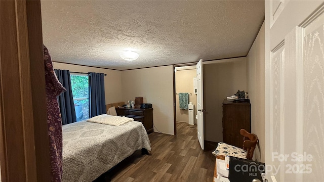 143 Hamilton Rd, Rutherfordton, NC 28139 - bedroom featuring dark wood finished floors and a textured ceiling