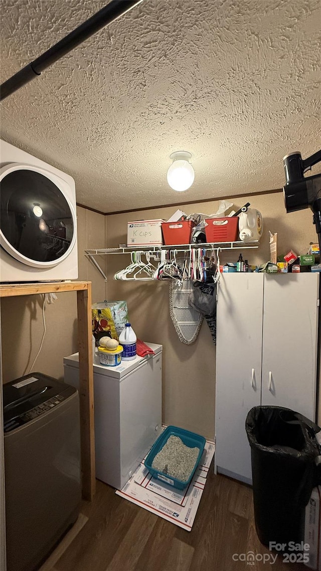 143 Hamilton Rd, Rutherfordton, NC 28139 - laundry room featuring washer and dryer, wood finished floors, and a textured ceiling