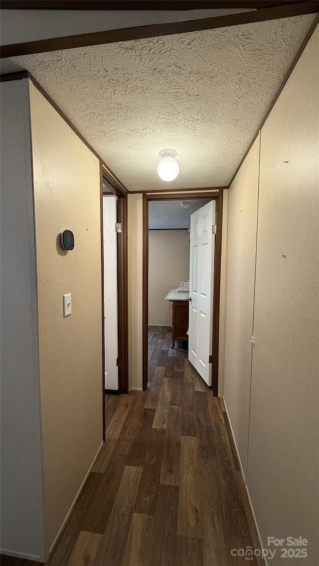 143 Hamilton Rd, Rutherfordton, NC 28139 - corridor with wood finished floors and a textured ceiling