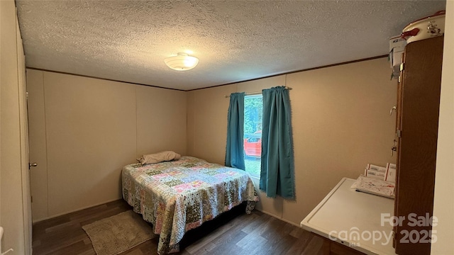 143 Hamilton Rd, Rutherfordton, NC 28139 - bedroom featuring wood finished floors and a textured ceiling
